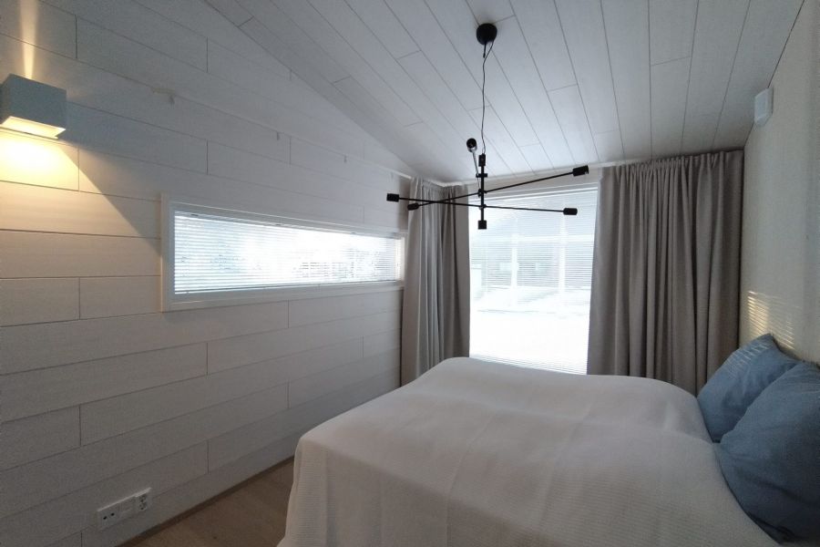 Taivutettu verhokisko